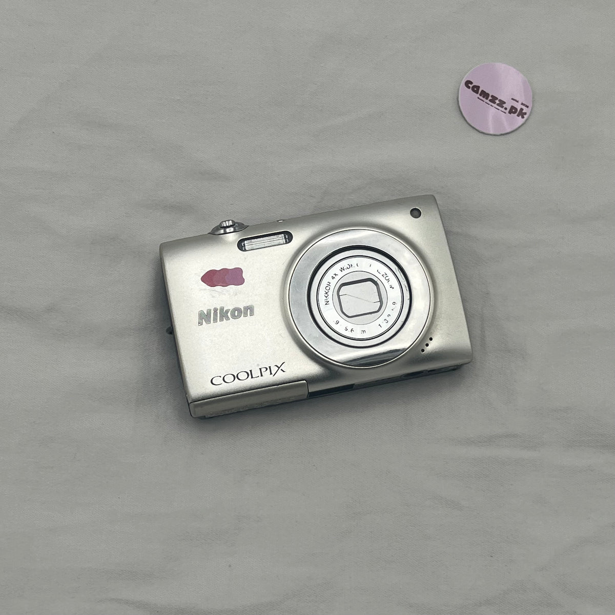 Nikon Coolpix S2500 slim compact digital camera with NIKKOR lens